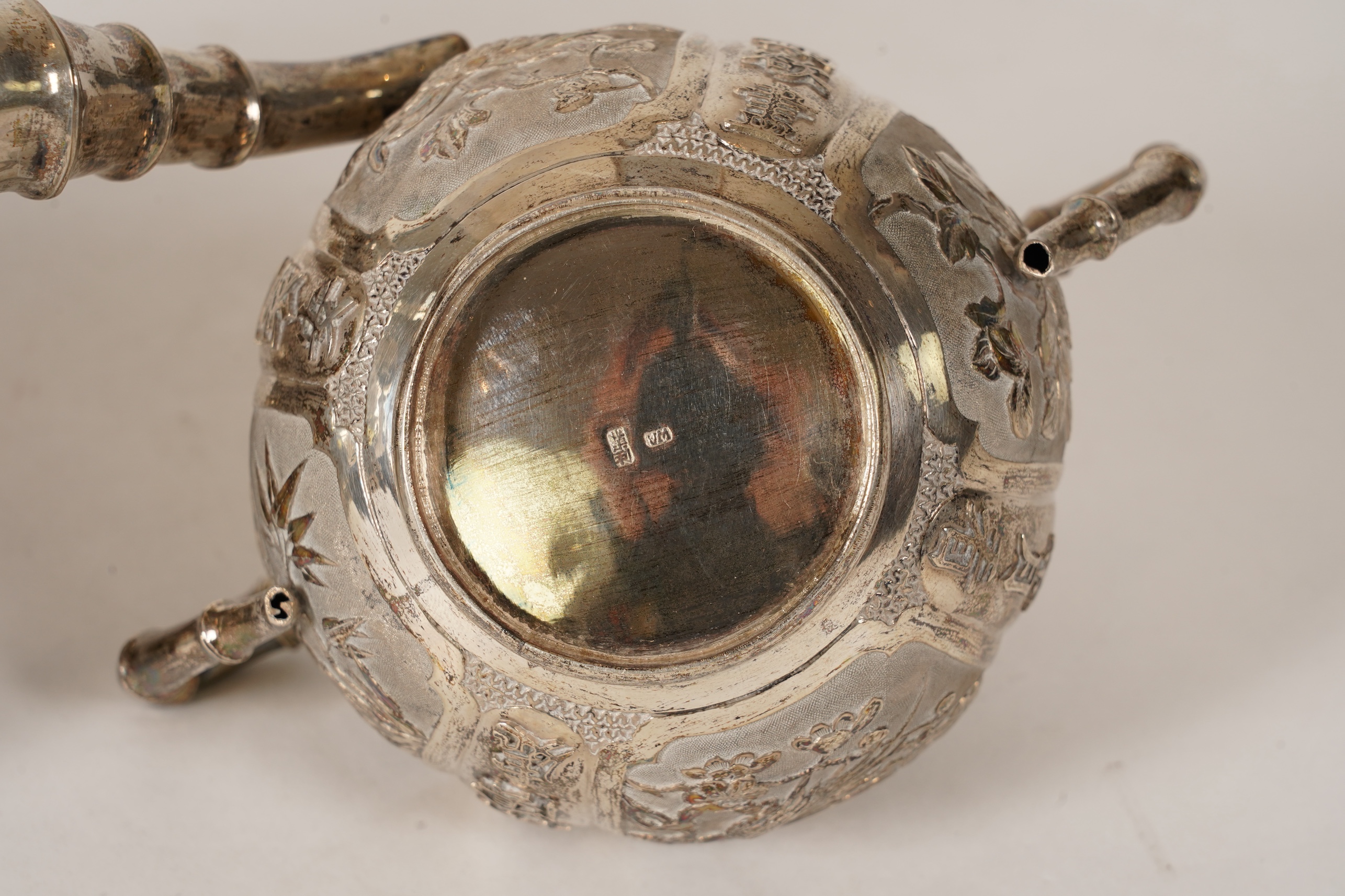 A late 19th/early 20th century Chinese Export white metal three-piece tea set, maker's mark WA